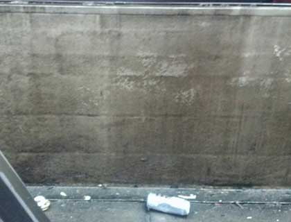 Before: Car wash tunnel wall degreasing