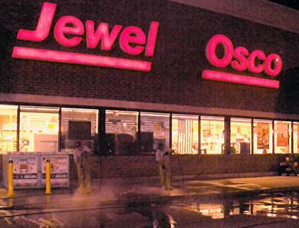 Overnight storefront and sidewalk washing at a grocery store