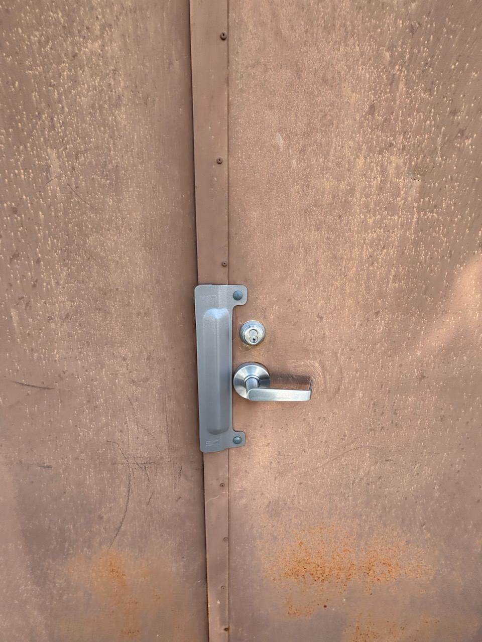 Lock guard installed on a service door