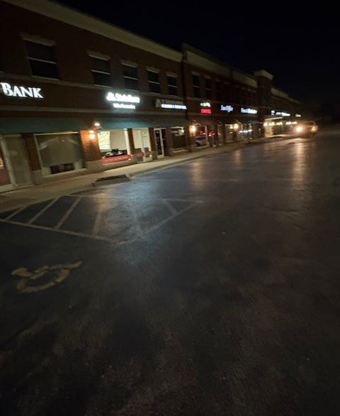 After: Porter clean-up along a storefront curb