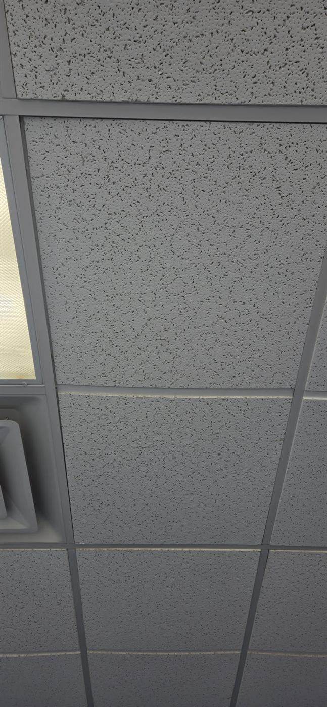 After: Water-stained ceiling tiles replaced