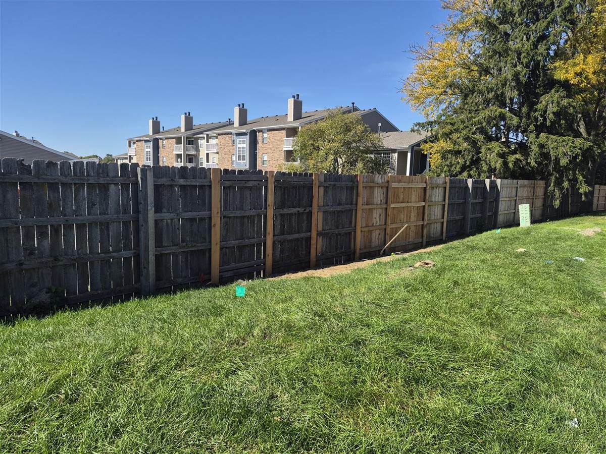 After: Fallen fence section rebuilt