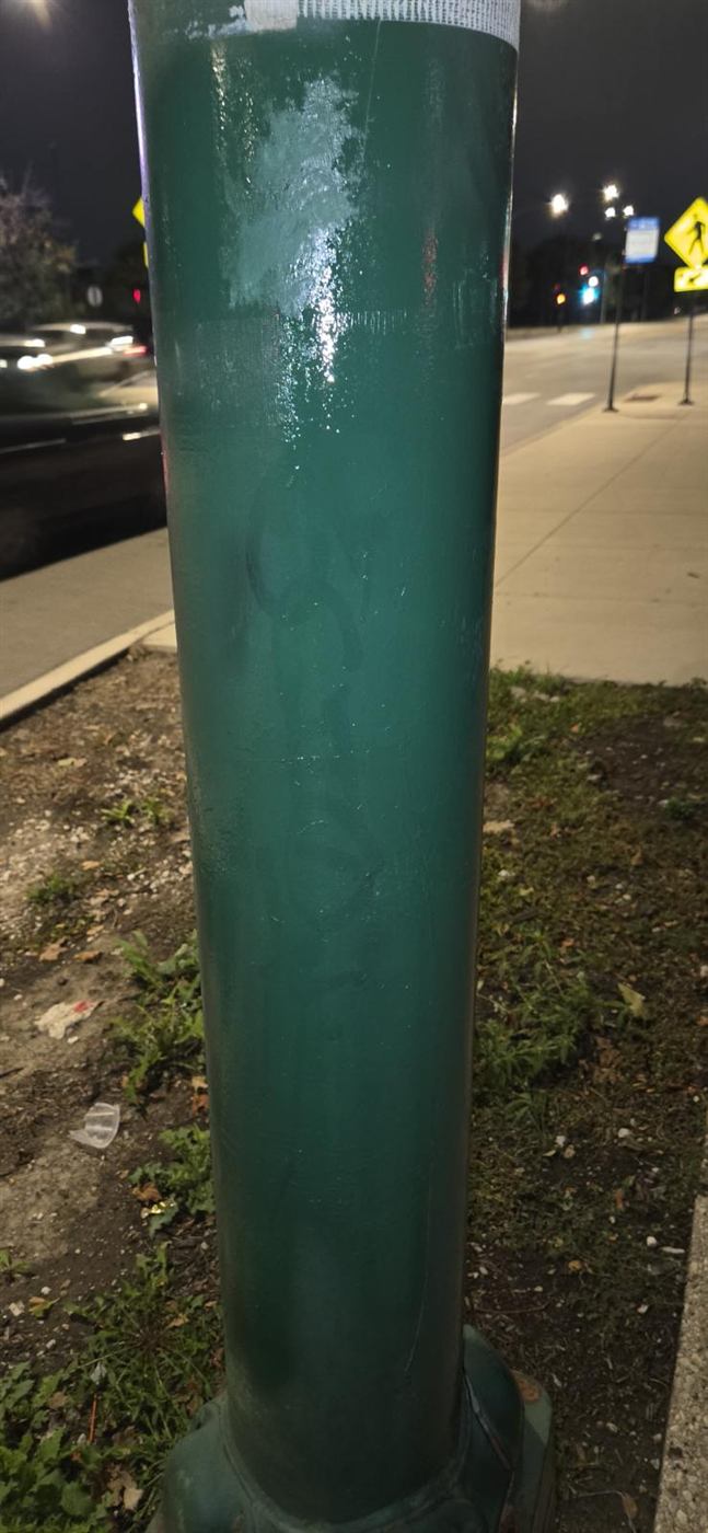 After: Graffiti removed from a light pole