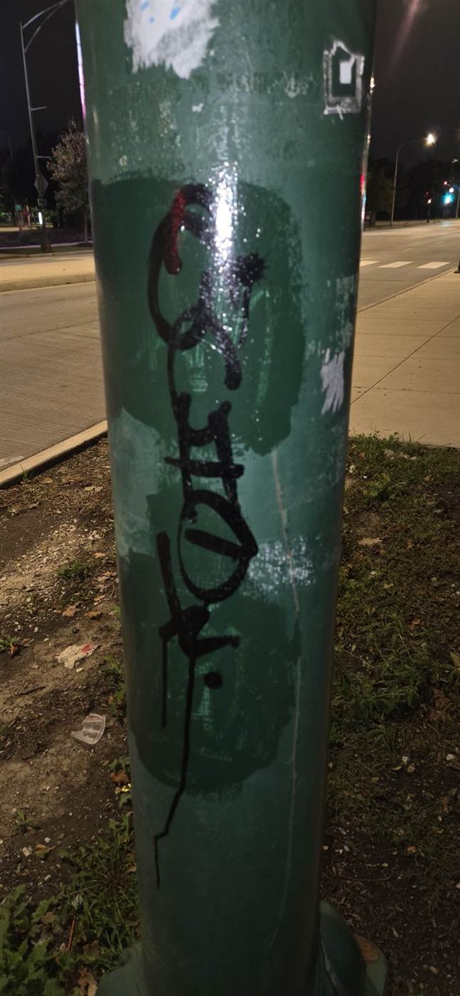 Before: Graffiti removed from a light pole