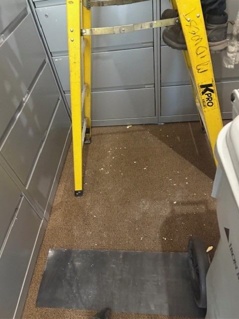 Before: Construction debris cleared from an office suite