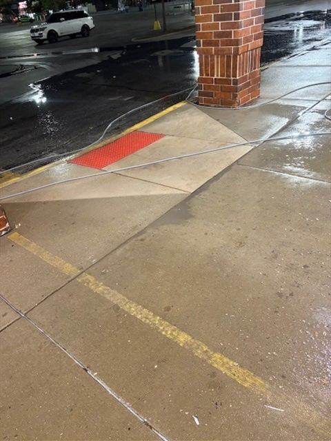 After: Gum and stains removed from a storefront sidewalk