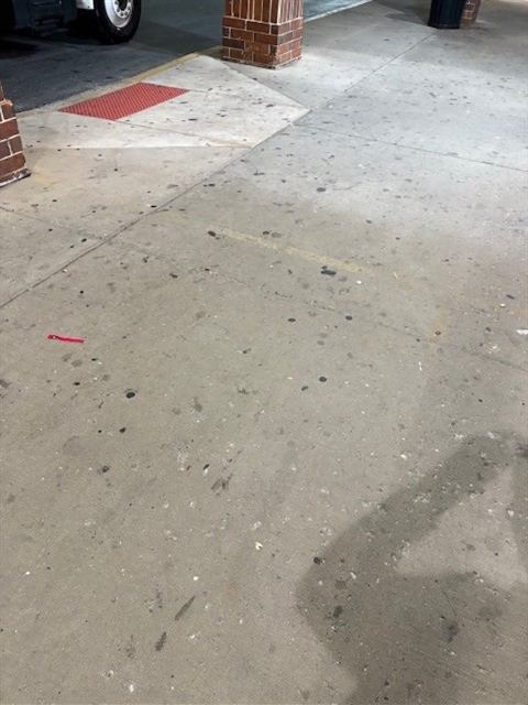 Before: Gum and stains removed from a storefront sidewalk