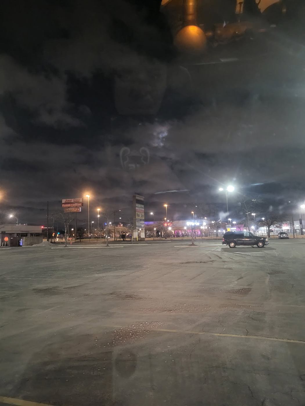 After: Sweeping: winter sediment and grit swept from the parking lot