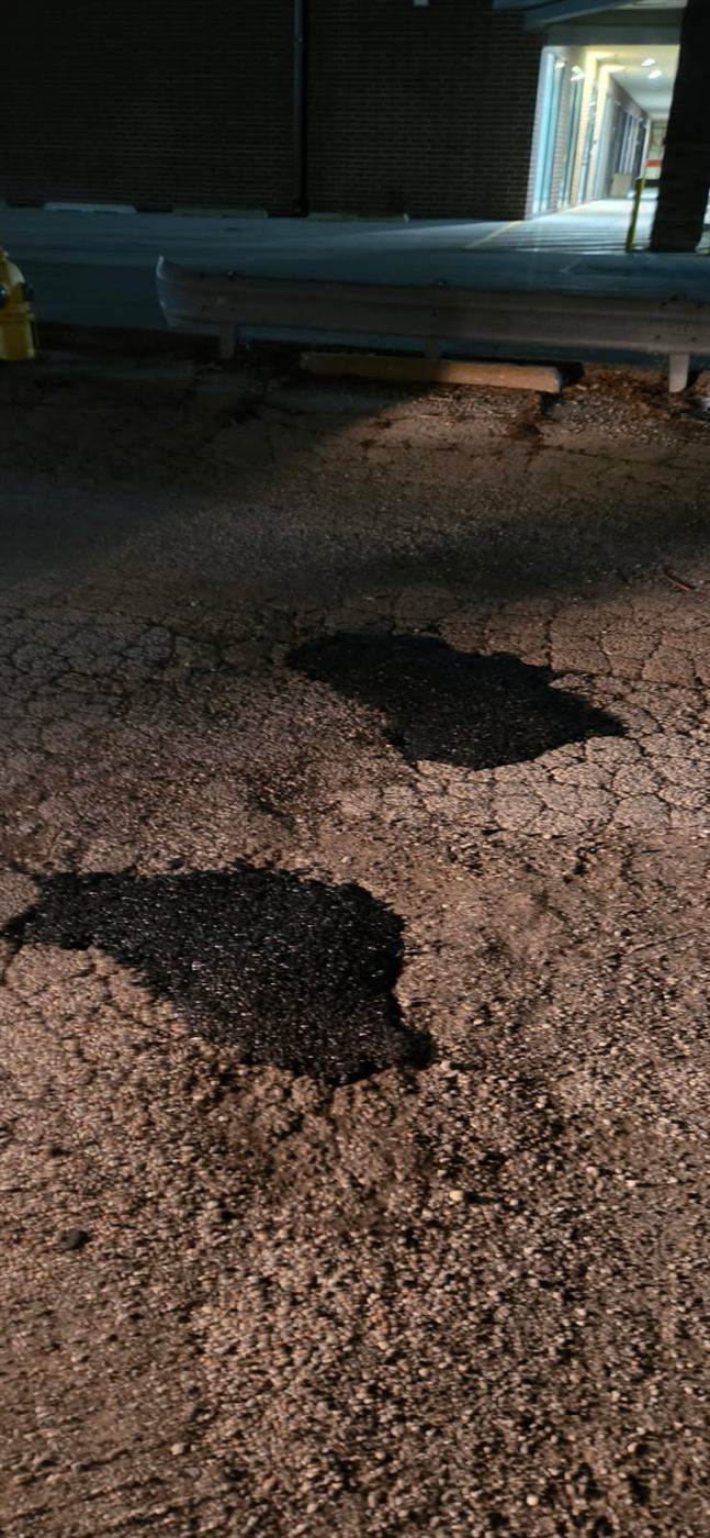 After: Cold patch repair of multiple potholes