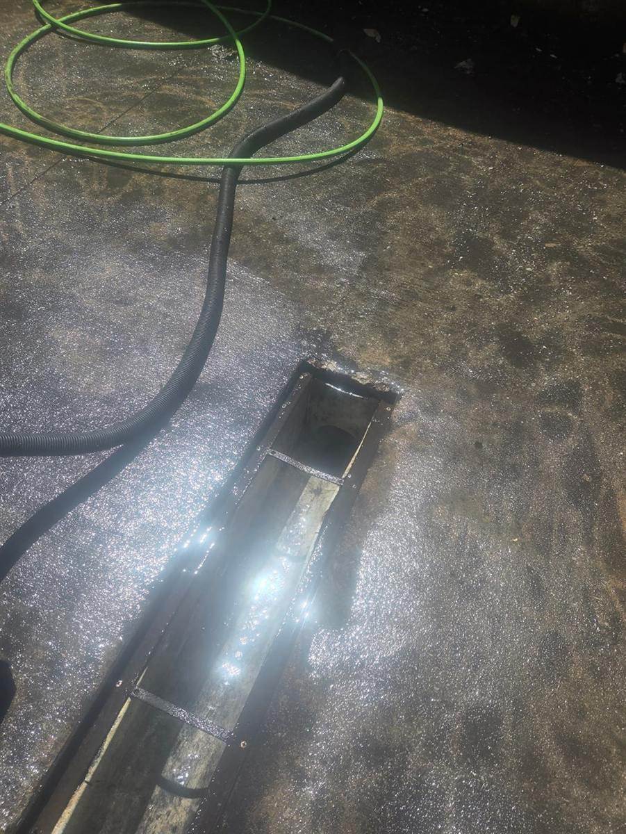 Drain service in progress