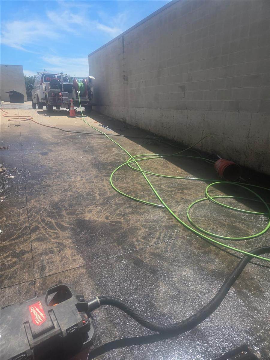 After: Loading dock drain cleared by our crew