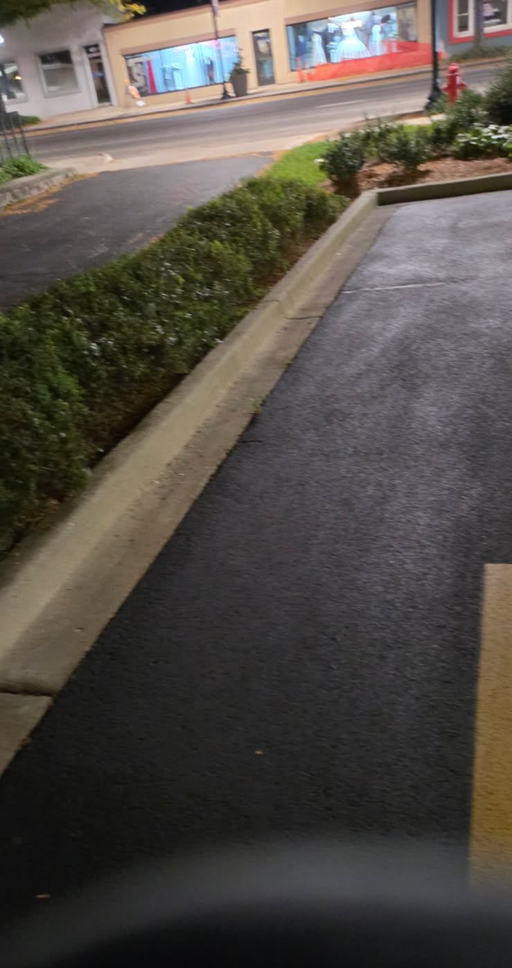 After: Fall leaves cleared from a drive aisle