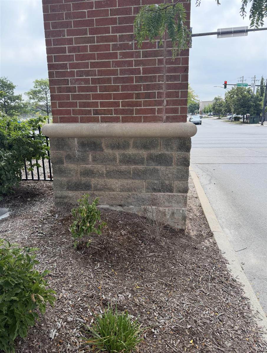 Masonry column repair completed