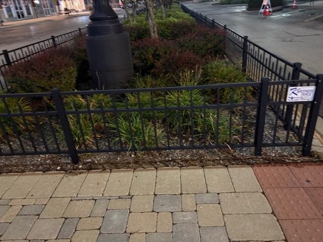 After: Litter picked up from a landscape bed by our porter