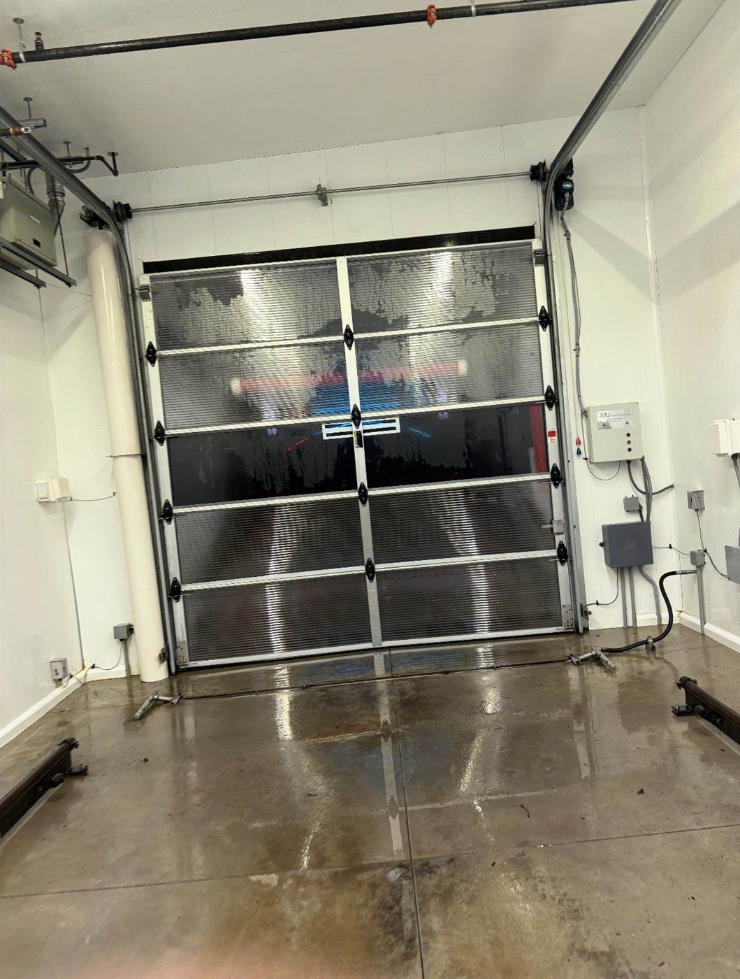 After: Car wash bay floor degreased