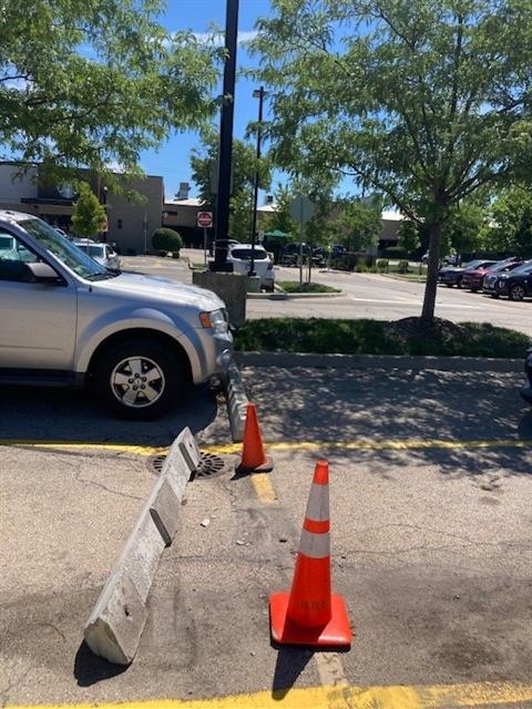 Before: Broken curb stops replaced and realigned