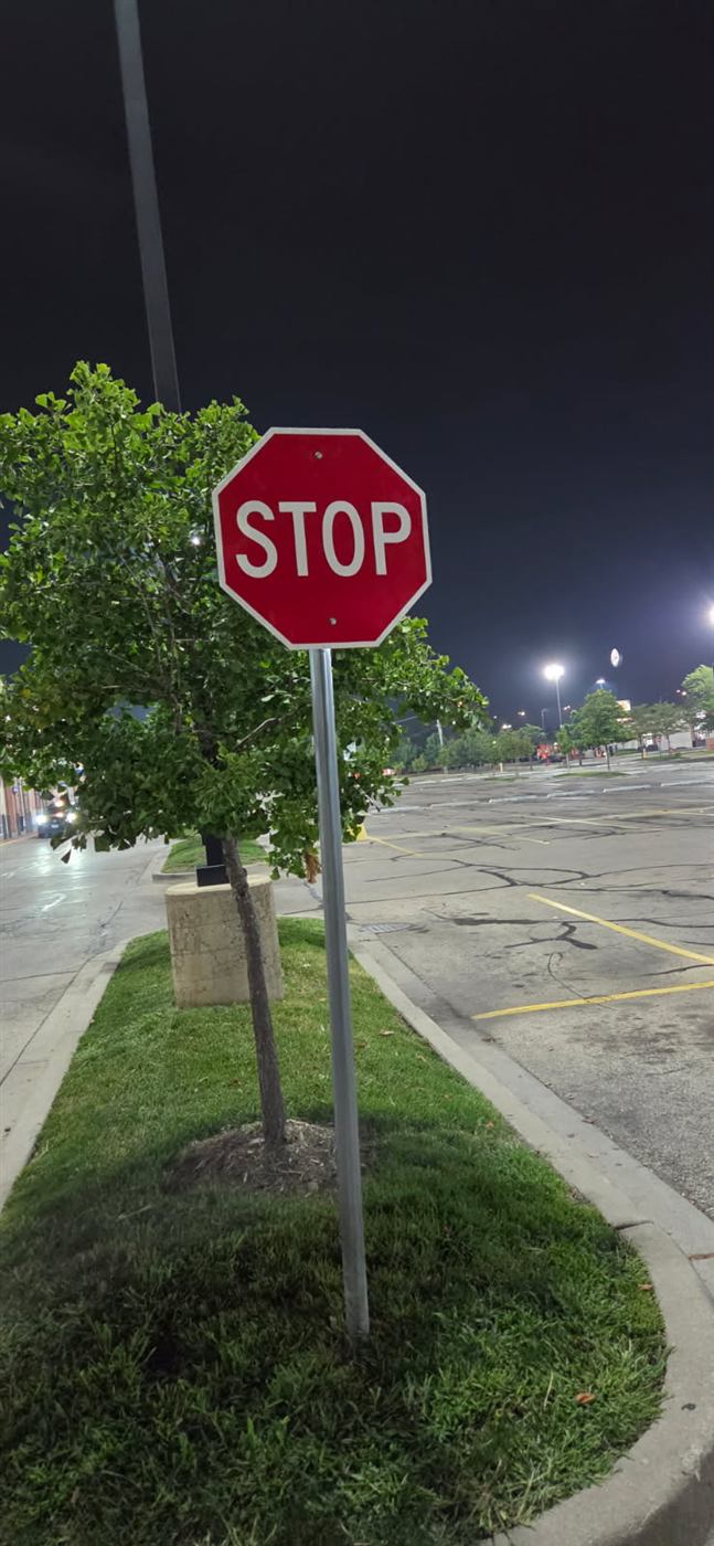 After: Damaged stop sign replaced