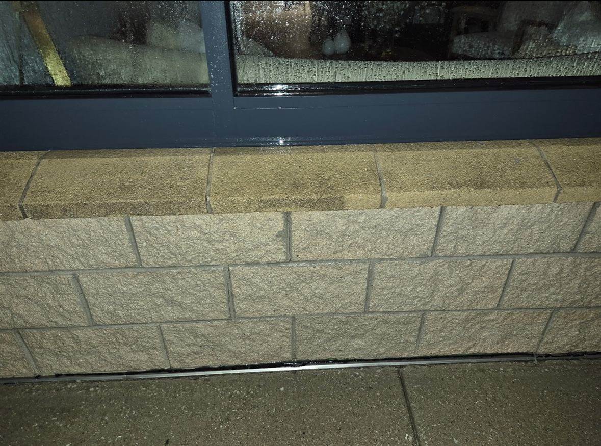 Building base cleaned with hot water