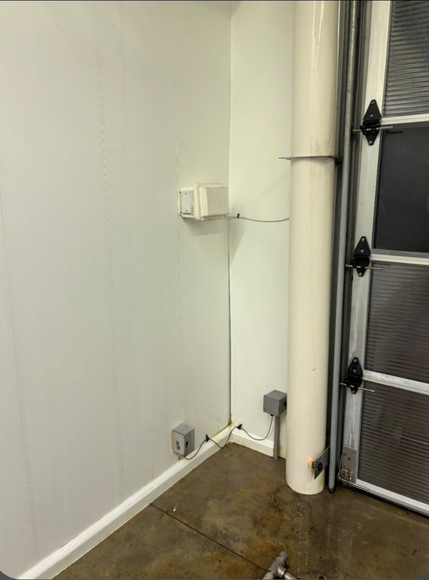 After: Algae and grime removed from car wash walls