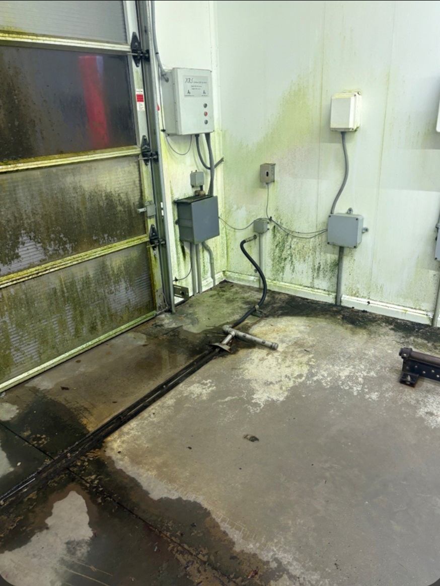 Before: Car wash equipment room walls and floor degreased
