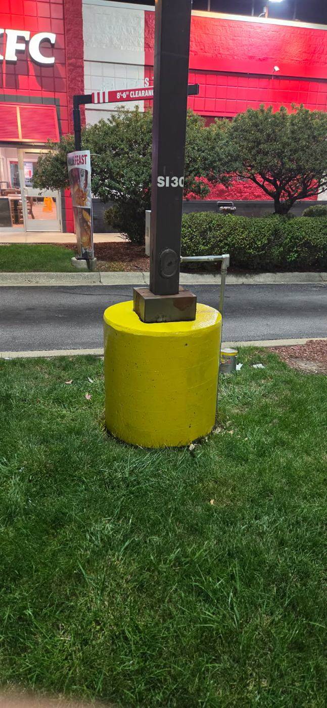 After: Damaged light pole base reported by our porter and repaired