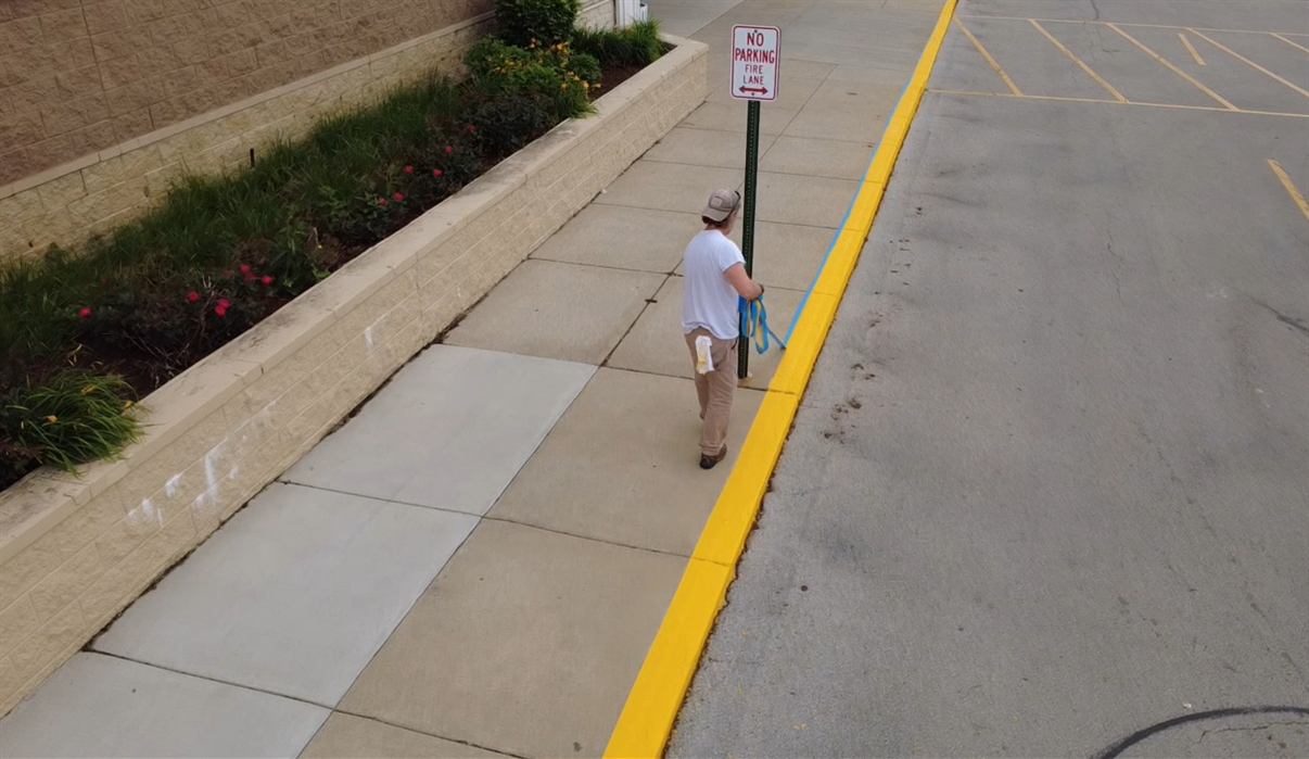 After: Fire lane curb repainted